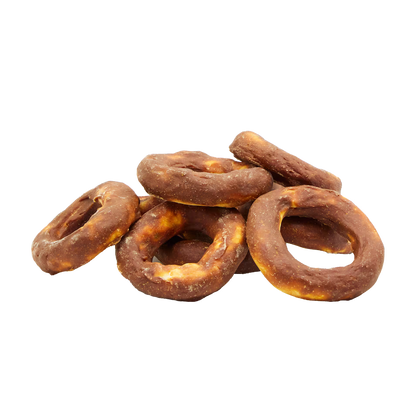 UniQ poslastice za pse, 500 g, jagnjetina na kolutovima od sirove kože (10 cm)